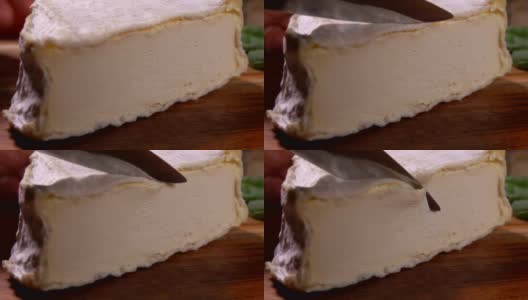 刀切一块绵软美味的山羊奶酪高清在线视频素材下载