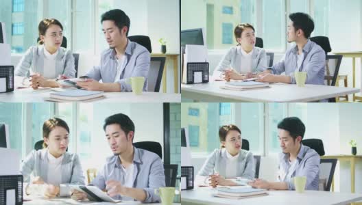 年轻的亚洲商人和女商人在办公室会面高清在线视频素材下载