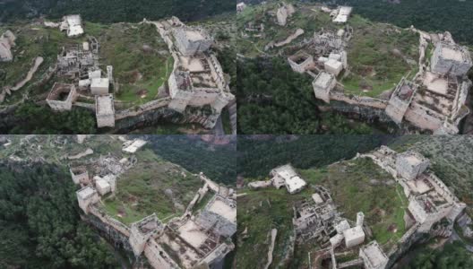 叙利亚的萨拉丁城堡。叙利亚战争后，一座废墟山顶上的中世纪城堡——无人机鸟瞰图高清在线视频素材下载