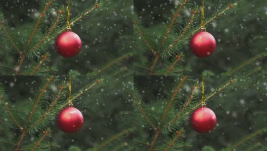 圣诞树上的红色小玩意，周围飘着雪花高清在线视频素材下载