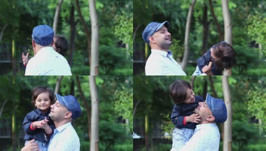 父亲和孩子在公园户外玩耍肖像高清在线视频素材下载