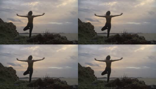 4k/年轻的亚洲苗条女子瑜伽在日落的海滩上，日出的背景。健身、运动、瑜伽、剪影、健康理念。高清在线视频素材下载