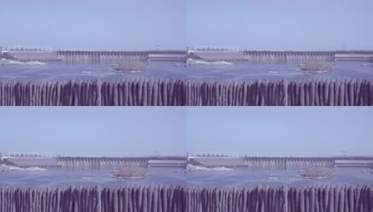 水电站因扎波罗泽塞克岛的栅栏而可见。乌克兰高清在线视频素材下载