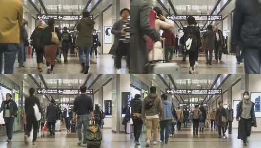 时光流逝:一群旅客在购物中心换乘火车高清在线视频素材下载