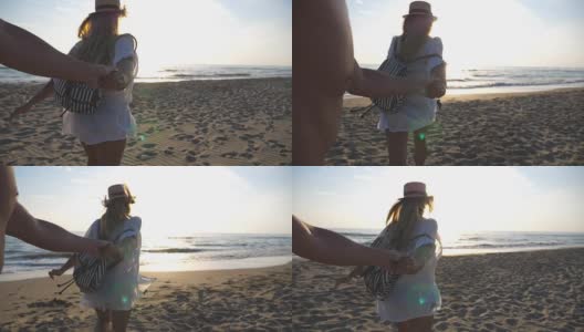 跟着我拍的年轻女子穿着衬衫背着背包拉着男友去海边。幸福的夫妇花时间一起在户外。暑假或假期概念。慢镜头观点高清在线视频素材下载