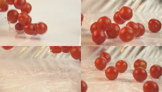 四段樱桃番茄坠落的慢动作视频高清在线视频素材下载
