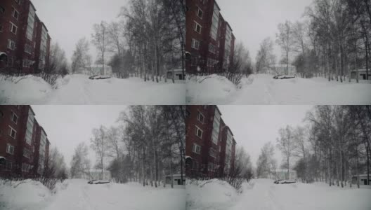 城里冬天，下雪了，街上，平房，树上高清在线视频素材下载