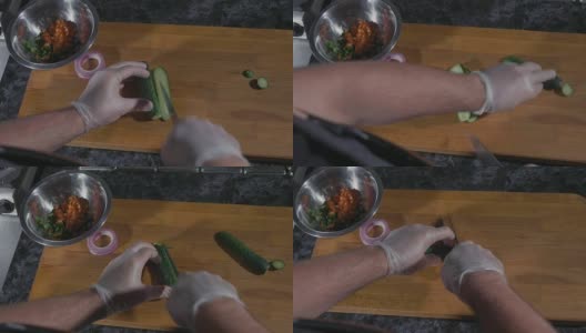 专业厨师在商用厨房用手套切黄瓜高清在线视频素材下载