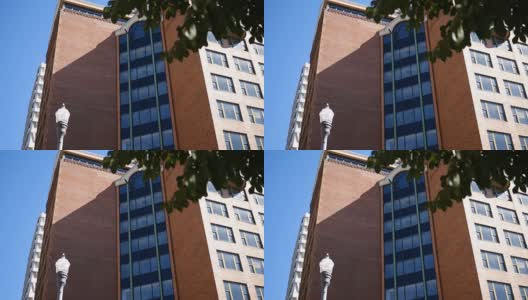 白天拍摄的市中心公寓大楼高清在线视频素材下载