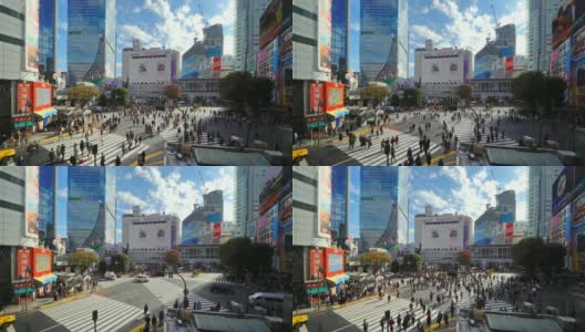 在日本东京的银座，一群人穿过涩谷街，世界上最繁忙的人行横道之一高清在线视频素材下载