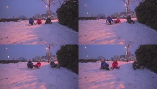一群可爱的孩子在雪地上玩滑梯高清在线视频素材下载