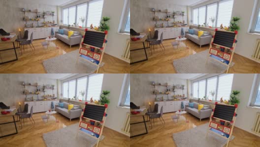 一室公寓，厨房，餐桌，沙发和孩子玩具高清在线视频素材下载