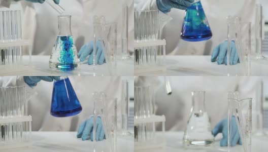 化学家向装有液体的锥形瓶中加入物质，进行化学实验高清在线视频素材下载