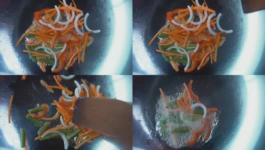 放入蔬菜，与胡萝卜、胡椒粉、洋葱一起翻炒高清在线视频素材下载