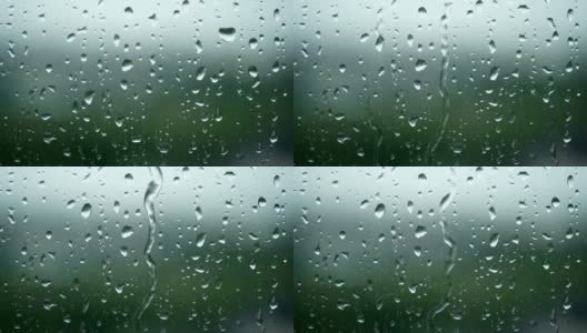 4 k。雨落在窗户表面。雨落在下雨天高清在线视频素材下载