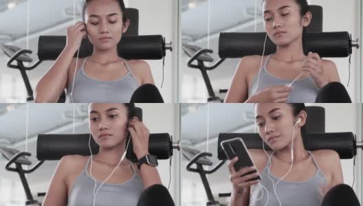 在健身房听音乐，放松高清在线视频素材下载