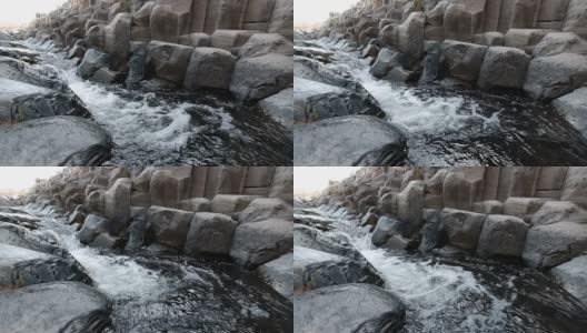 玄武岩池形成过程中缓慢流动的水流高清在线视频素材下载