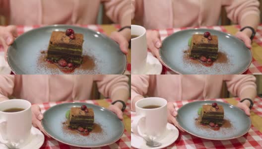 演示抹茶绿茶层蛋糕上的黑巧克力高清在线视频素材下载