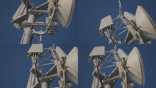卫星天线和中继器对着蓝天。数据传输系统开发的概念高清在线视频素材下载