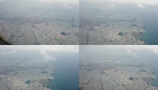 天空中的城市景观，从飞机的角度看4k视频云高清在线视频素材下载