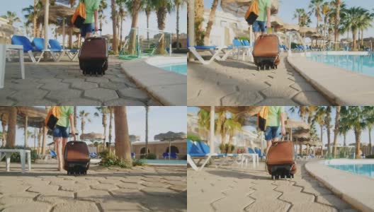 斯坦尼康热女人与旅行袋车轮上是在休闲区高清在线视频素材下载