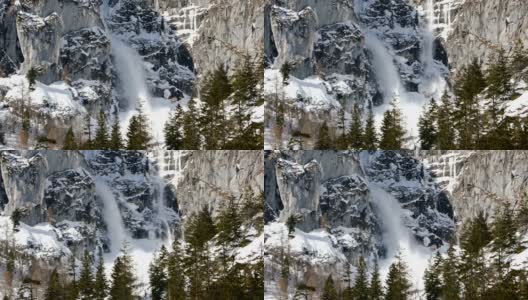 小雪崩，雪从悬崖流下高清在线视频素材下载