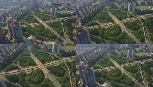白天时间深圳市著名交通路口航拍全景4k倾斜移位中国高清在线视频素材下载