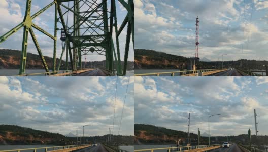 车辆视角拍摄的驾驶在哥伦比亚河胡德河桥上与交通在俄勒冈州在日落高清在线视频素材下载