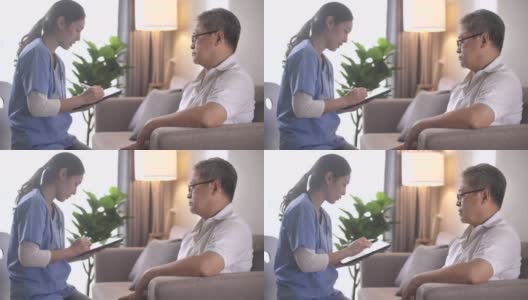 护士和病人在病人家中使用数字平板电脑进行医疗咨询高清在线视频素材下载