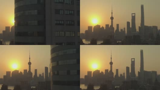 日出时分的上海。陆家嘴地区。中国鸟瞰图。无人机飞行。中景镜头高清在线视频素材下载