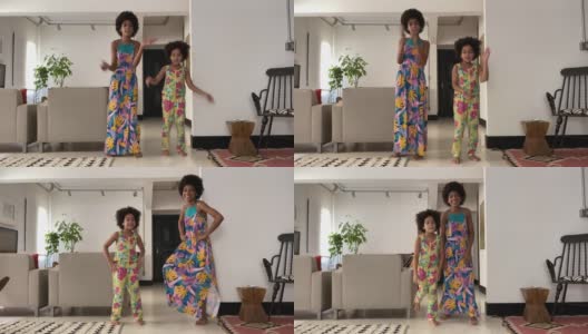 姐妹在家里跳舞-移动相机的视角高清在线视频素材下载