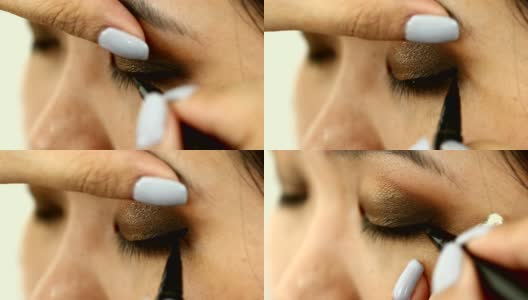 女性使用眼线化妆美容高清在线视频素材下载