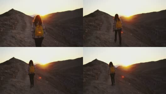行走在智利阿塔卡马沙漠中的女子高清在线视频素材下载