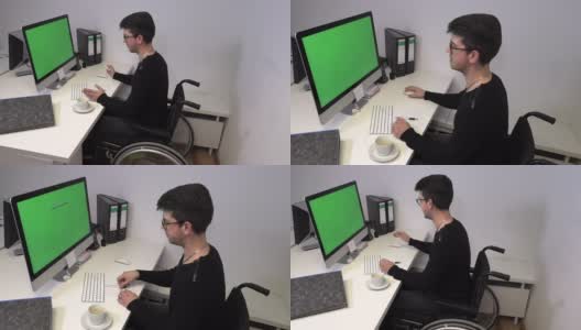 一个坐在轮椅上的经理，一个不能在他工作的电脑前行走的年轻人，慢动作高清在线视频素材下载