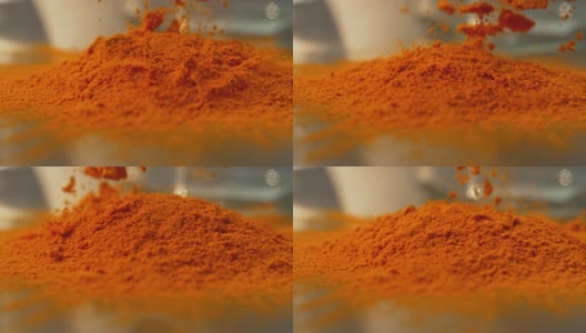 SLO MO LD橙色香料粉落在表面高清在线视频素材下载