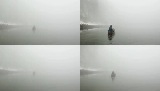 在雾中划独木舟高清在线视频素材下载