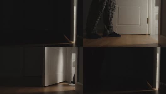 一个穿着睡衣和拖鞋的老人晚上在家里上厕所高清在线视频素材下载