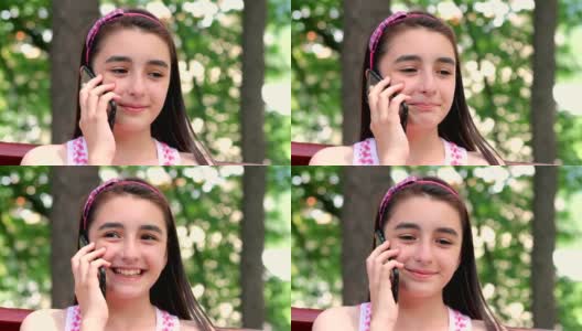 少女用智能手机近距离交谈高清在线视频素材下载