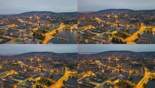 傍晚时间照明苏黎世城市景观，湖边航空全景，4k时间流逝瑞士高清在线视频素材下载