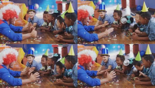 在4k生日派对上和孩子们玩的小丑高清在线视频素材下载