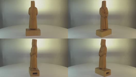 木雕枫。用木头雕刻的东正教牧师雕像高清在线视频素材下载