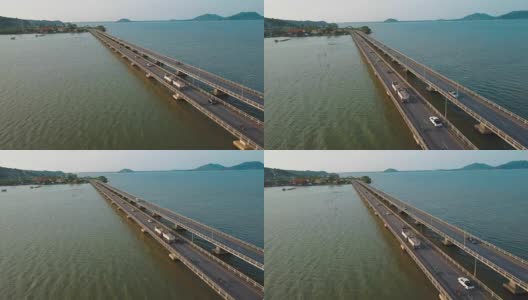 泰国宋克拉河上的卡车驾驶桥的鸟瞰图高清在线视频素材下载