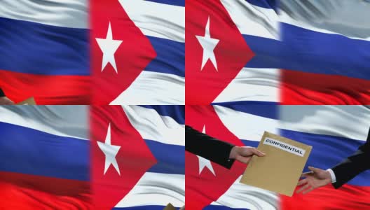 俄罗斯和古巴官员交换机密信封，旗帜背景高清在线视频素材下载