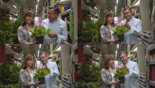 一对快乐的成熟夫妇在一家家装店买了一株植物，看起来很满意，面带微笑高清在线视频素材下载