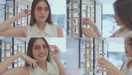 年轻的亚洲女人在光学商店选择眼镜高清在线视频素材下载