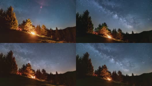 神奇的星星天空与银河银河在野生森林的自然和朋友坐在篝火在繁星的夜晚天文学时间流逝高清在线视频素材下载