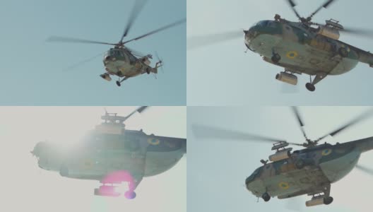 军用直升机在蓝天背景下飞行高清在线视频素材下载