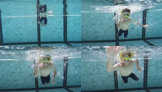 一个亚洲男孩在游泳池的水下玩耍和游泳高清在线视频素材下载