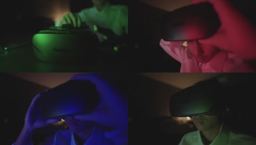 年轻人使用虚拟现实耳机在晚上放松高清在线视频素材下载