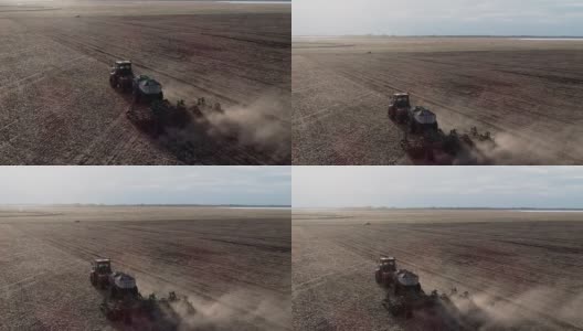 工业农田鸟瞰图的农村工作的土地上的农业机械高清在线视频素材下载